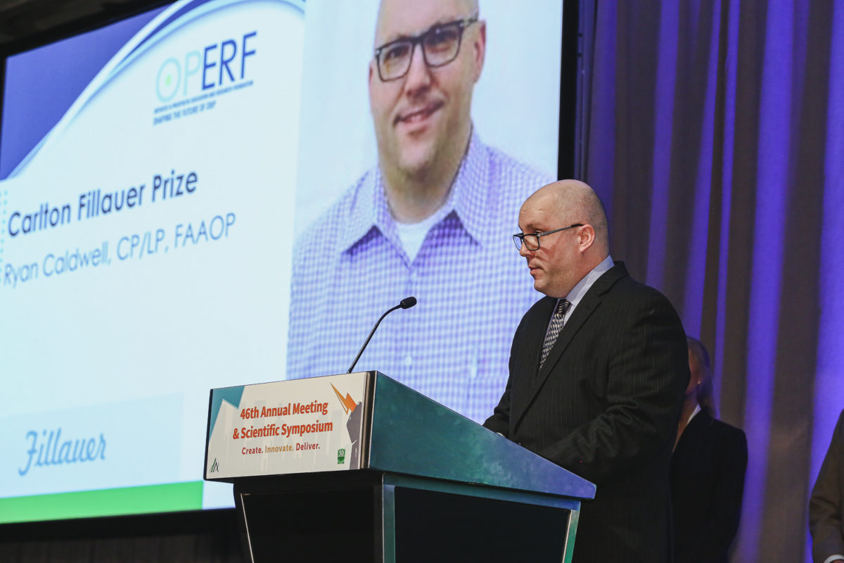 Ryan Caldwell accepts the Carlton Fillauer Prize